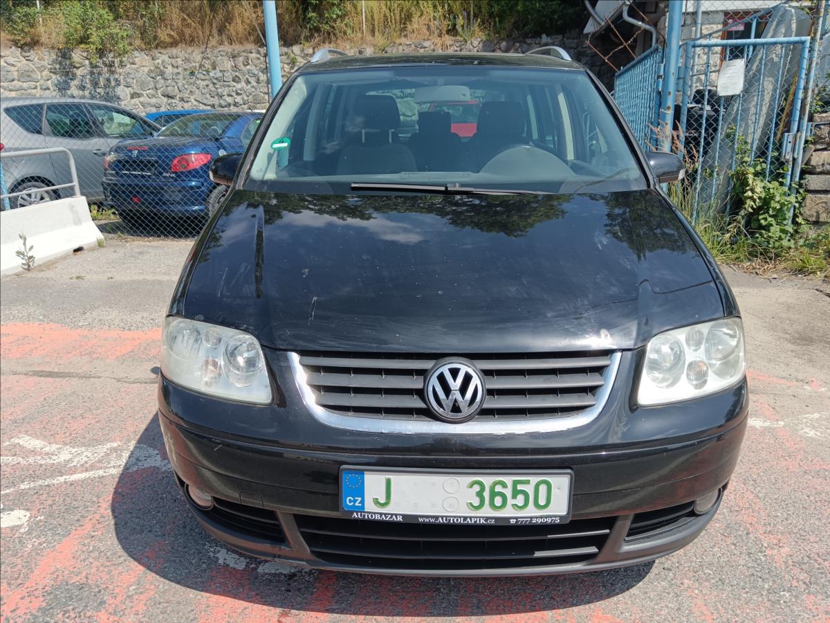 volkswagen-touran-1-9-tdi-highline - 1