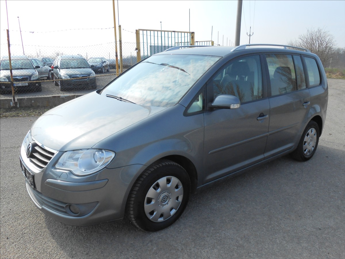 volkswagen-touran-2-0-103-kw-klima-historie - 1